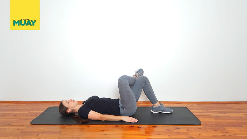 Piriformis Stretch Knee to Opposite Shoulder Step 1